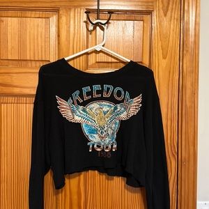 Cropped black long sleeve “Freedom Tour 1988.” Size Large from Altered State.